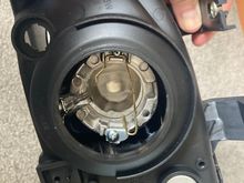 You can see the back of the reflector bowl, where the projector will mount, here: