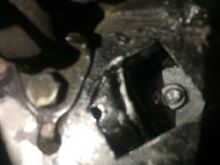 Nut on top of big washer torqued to like 35 lbs/ft