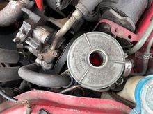 Bone dry power steering. Really loose in the bay, shakes around and looks like the cap is in there