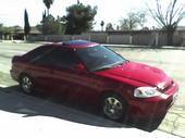 my em 1 posted up in front of the homies pad