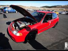 hatch at laguna seca. h2b h22. 
jdm h22 engine.
golden eagle intake manifold
k&amp;n filter
QSD h2b transmission adapter plate
fidanza flywheel
ACT 6 puck clutch
b16 tranny with quaife lsd(4.785final drive soon)
stock axles
hasport b-series motor mounts
dc header
fluidyne radiator
msd sci ign. box, blaster ss coil, msd cap and msd wires.
neptune RTP board on p28 ecu.
NGK afx o2 wideband. 
320mm momo tuner wheel, NRG quick release and hub.
front civic eg9 seats, stock rear seats.
16" rota c10 in flat black with falken 615 215/45/16.
RL 4 piston calipers, 11.8" re-drilled rotors with fastbrakes.com bracket kit, SS braided brake lines and stock DA rear brakes.(oem pads right now. carbotech pads soon)  
15/16" integra brake master cylinder and booster.
gsr front sway bar and 23mm ITR rear sway bar.
full-race traction bar.
home made alternator bracket, battery tie down and rear tow hook. 
skunk2 front camber arms
skunk2 pro-s suspension with 18k springs all around.
skunk2 shift knob.
15mm wheel spacers up front.