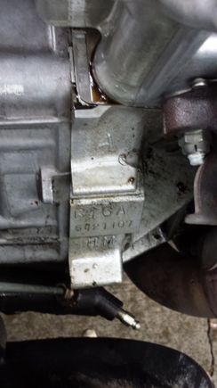 looks like an A or a 4 stamped above the block. Also I believe this is the same area I should be looking for the trans stamp and there is nothing else there just a blank space
