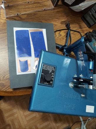 step 7 - I use a heatpress to transfer the toner to the boards
