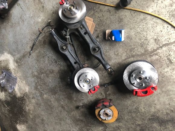 The backs were super easy. The bolt in hubs made the process doable in an hour or two. The fronts required a press so not so much. In the corner you can see the old brakes. 
