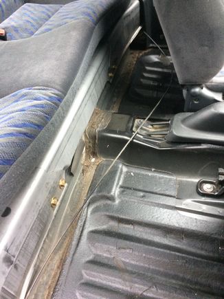 Any know what this cable sticking out below and in front of the rear seats is?  Thanks.