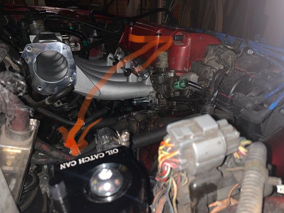 Out port straight to valve cover?