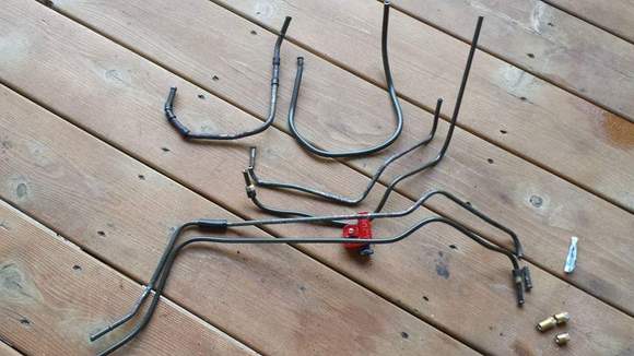 Used the original fittings and made my own new lines out of steel brake line.