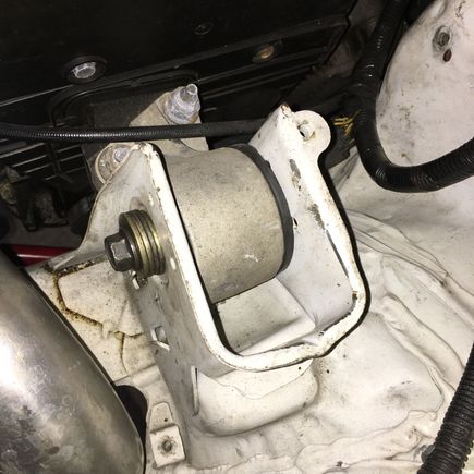 Here's what I had to do to get the one mount to tighten down, added the 4 washers.  I think this probably contributed to how much better the car feels as well.