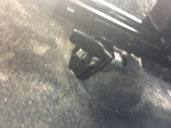 Rear mount, this was the tough one. I left one of the rivets in place, I turned the mount 180 and bent it forward. I had to notch it a bit to bend it. I drilled a new hole and bolted where the second rivet would go. Again like I said before I will get this tacked in place later for a little more safety.