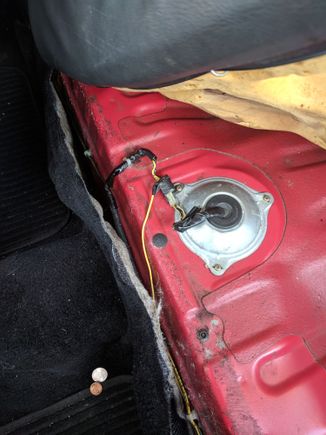 The wire on the right looks out of place. I traced it back and it connects to a brown wire under the driver side dash near the fuse box. Any idea what that wire is for?