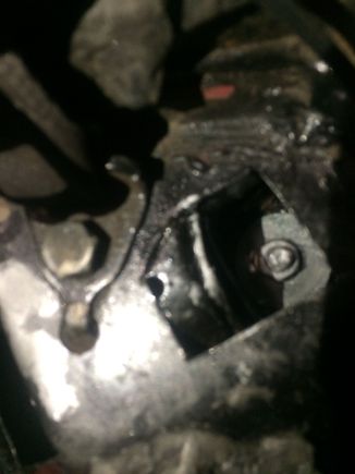 Nut on top of big washer torqued to like 35 lbs/ft