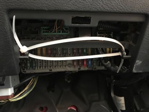 other footspace - i guess the ziptie is there so i don't kick the board in frustration over all the missing panels?