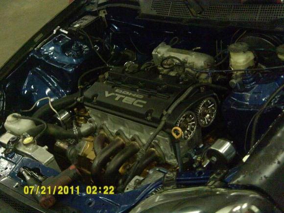 Aaand the intake manifold. When removing the head at from this point I would have to start by removing the intake manifold. It used to be a huge pain in the ass, I would have to pry foward from the header jus to gain the extra inch but after relocating the purportioning valve there is just enough room to slide the intake manifold off the studs turn it upward and flip right out with out even scrapping a thing