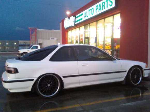 Previous owner removed lowering springs. It's sitting on stockies with hubcaps atm. :-(  Clean as can be though