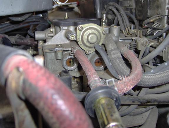 Float levels before rebuild. Note the aux bowl (on left) is over full. This dumped fuel into the cylinders fowling the plugs.
