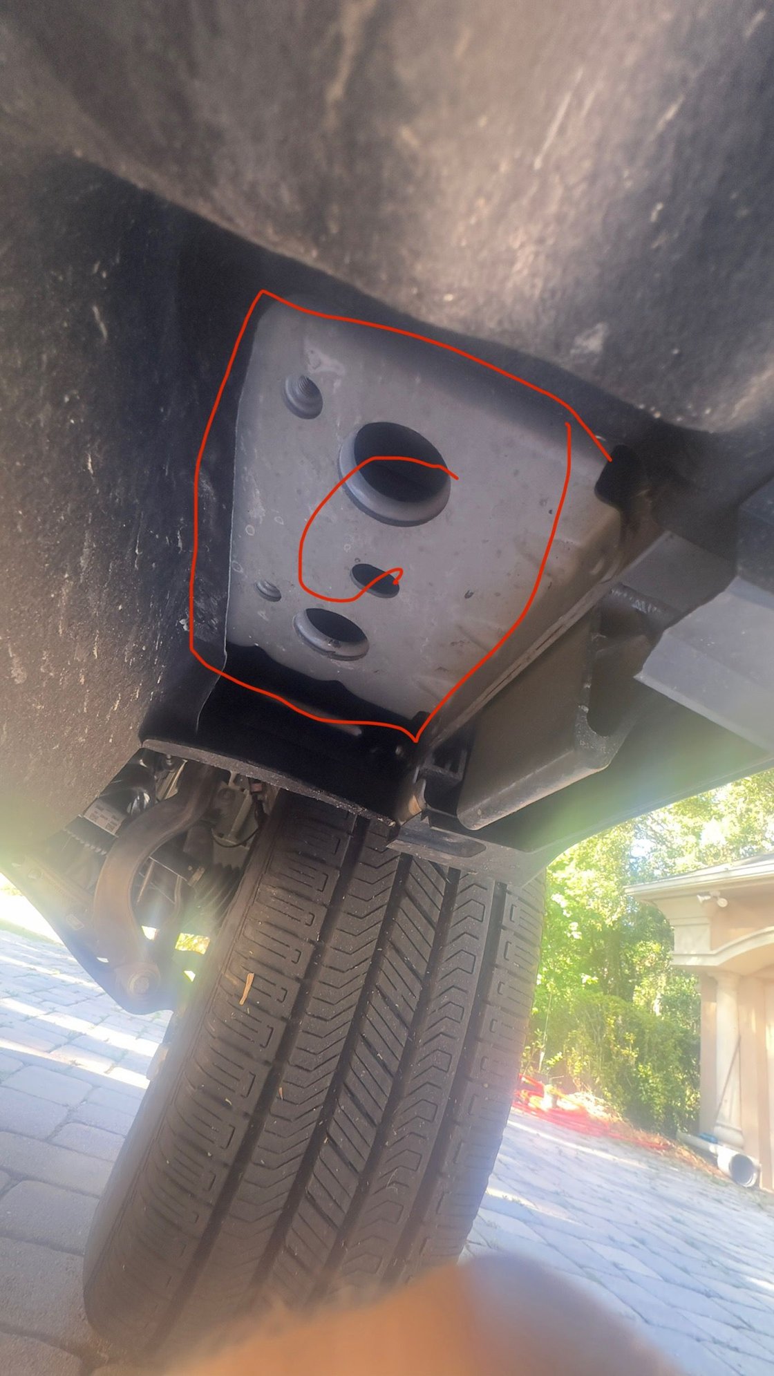 Point C- front wheel, next to pinch weld
