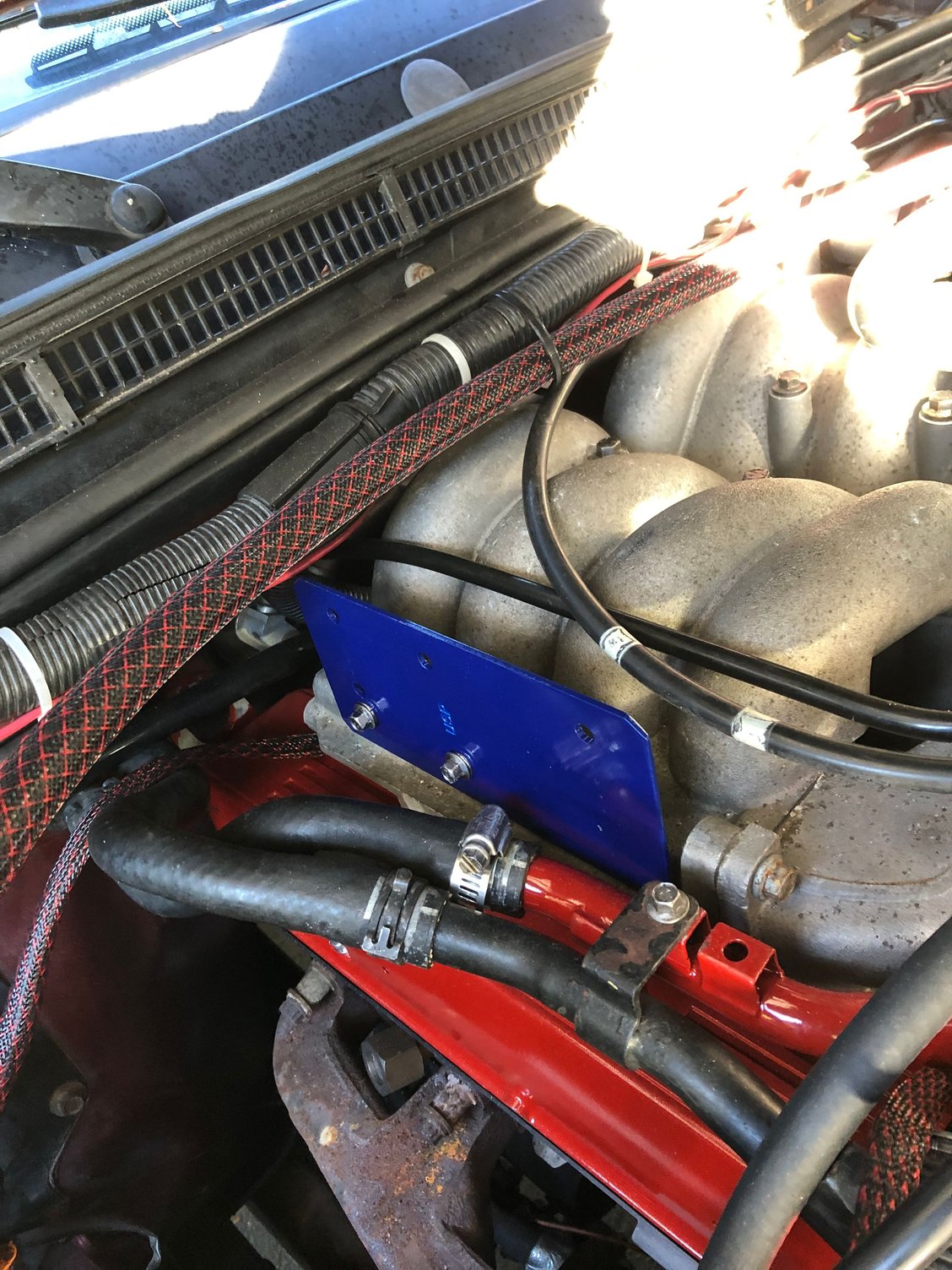 Used the mounting holes on the side of the manifold.