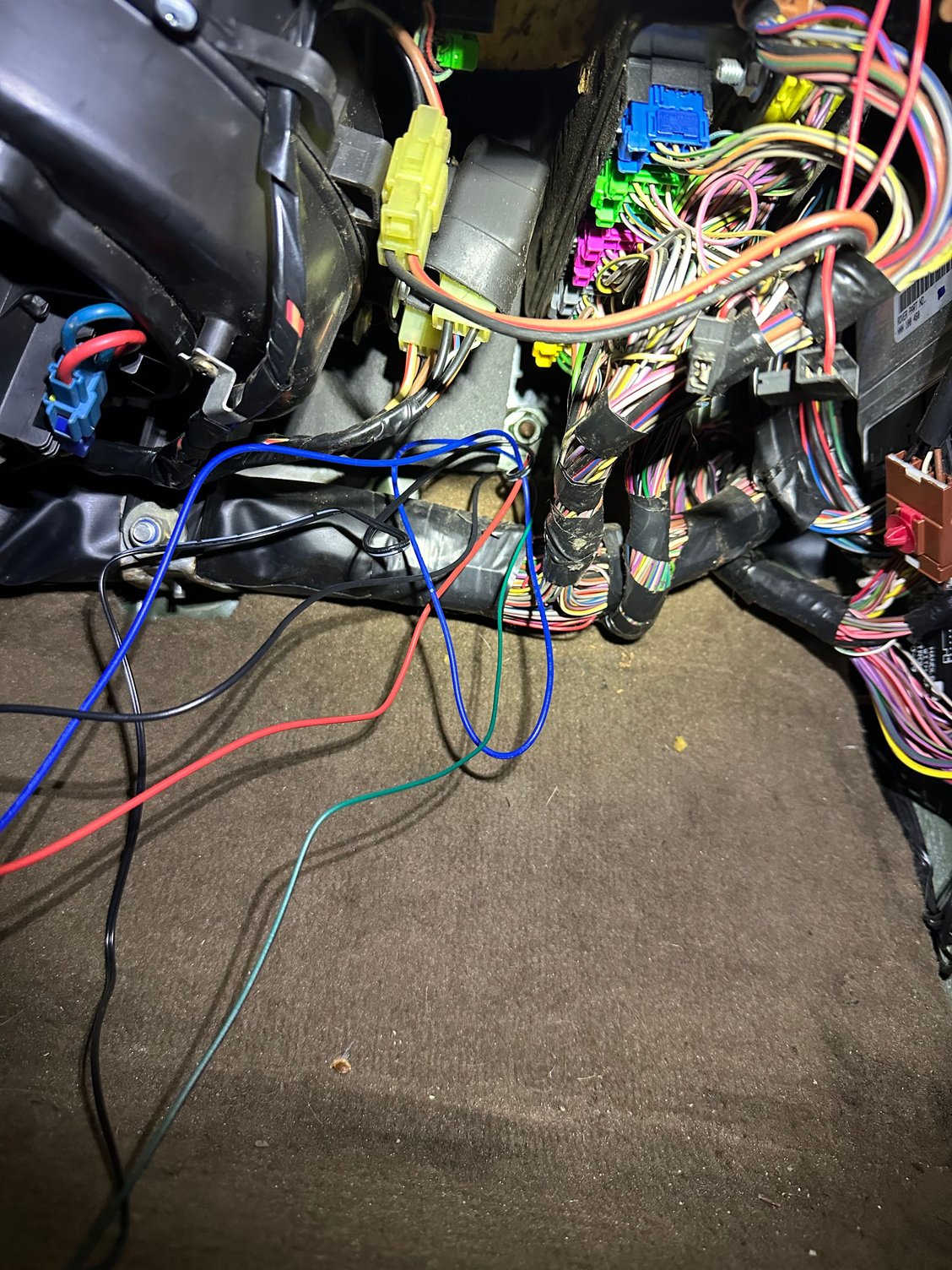 Footwell firewall hole wiring in progress