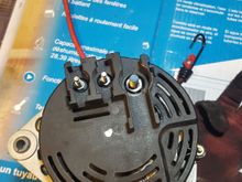 First, remove the four 9mm bolts that hold this cover on.  They are located around the outside of the cover, you can see one here on the very right side.