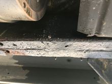 This is on the passenger side underneath the rear passenger seat area.
