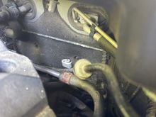 So upon further learning. It looks like maybe the rear ac delete was already done on this car?  I see this open line going downward which I’m guessing is to the rear?  Need to locate the other line. 

Is that where the delete kit happens? Near the fire wall in the engine bay?   

I’d love read ac. But if its bypassed sort of helps me tracking down the main culprate for now I feel. 

I feel like I can hear a bit of air around the condenser when I just put a tap of pressure in the low line car off