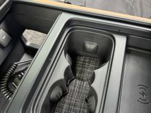 Cupholder (2020 only). I thought this would be cheesy but I love seeing it down there. It is way better in person. It’s quite dapper. 