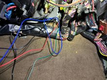 Footwell firewall hole wiring in progress