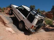Wheels up while going up Upchuck obstacle near Moab