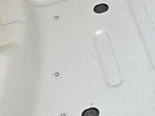 Location of the two plugs in the rear compartment under the foam. From what I can see in this low quality video screen grab, these look VERY different from my plug. 