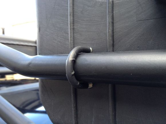 Using a U-Bolt to secure Pelican case on roof rack. I used a heat shrink tubing to insulate the u bolt to minimize rattle.