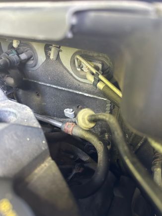 So upon further learning. It looks like maybe the rear ac delete was already done on this car?  I see this open line going downward which I’m guessing is to the rear?  Need to locate the other line. 

Is that where the delete kit happens? Near the fire wall in the engine bay?   

I’d love read ac. But if its bypassed sort of helps me tracking down the main culprate for now I feel. 

I feel like I can hear a bit of air around the condenser when I just put a tap of pressure in the low line car off