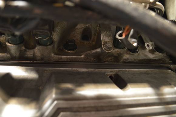 Once it is in place before putting screws in check the gasket is still seated correctly to the valve cover