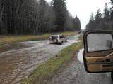 notice the disco is IN the water and the wrangler is on the sidelines taking pics