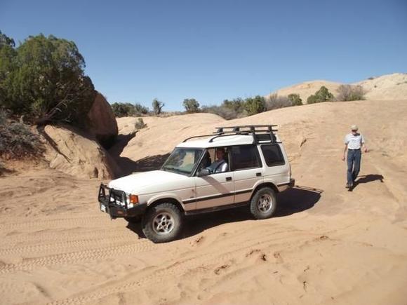 march2011moab 029.  My spring break college son driving between Tower and Eye of Whale Arches.  Not me on the right.  He's a Jeeper.