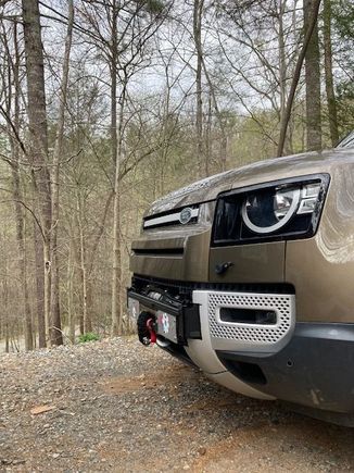 I am not prepared to forego the crash cans or shorten them; keeping them in case of a frontal collision.  My tray is exposed --- a look I like anyway (its a working winch, after all -- not decoration).   The hidden winch thing confuses me. 