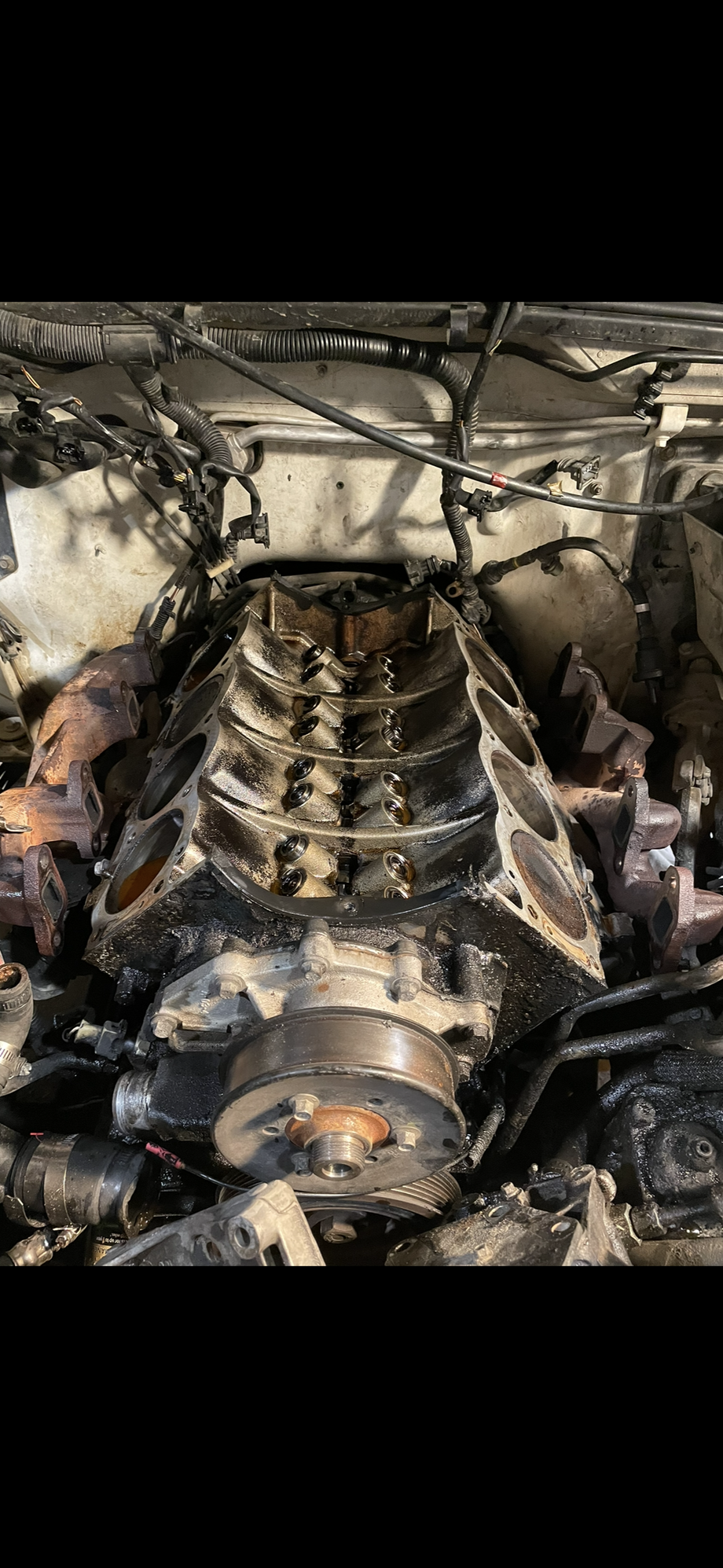 Outside compression leak #6 cylinder. Same exact place it blew 60k miles ago. Gasket blows on the block side, there is a defect but wasn�t really excited about pulling the block and having it decked. I can do head gaskets in my sleep so if I get 60k out of this set I�ll be pleased.