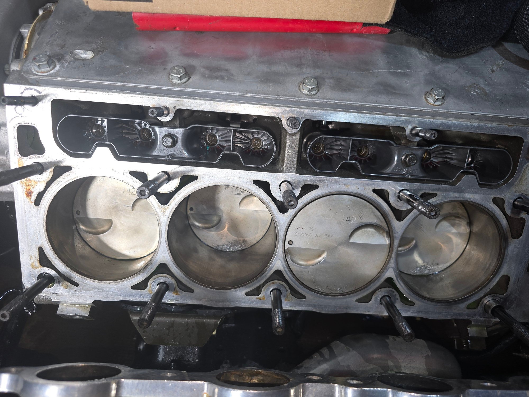 Piston tops 3 and 7 look pretty beat up. Cylinder walls look good woth no damage.