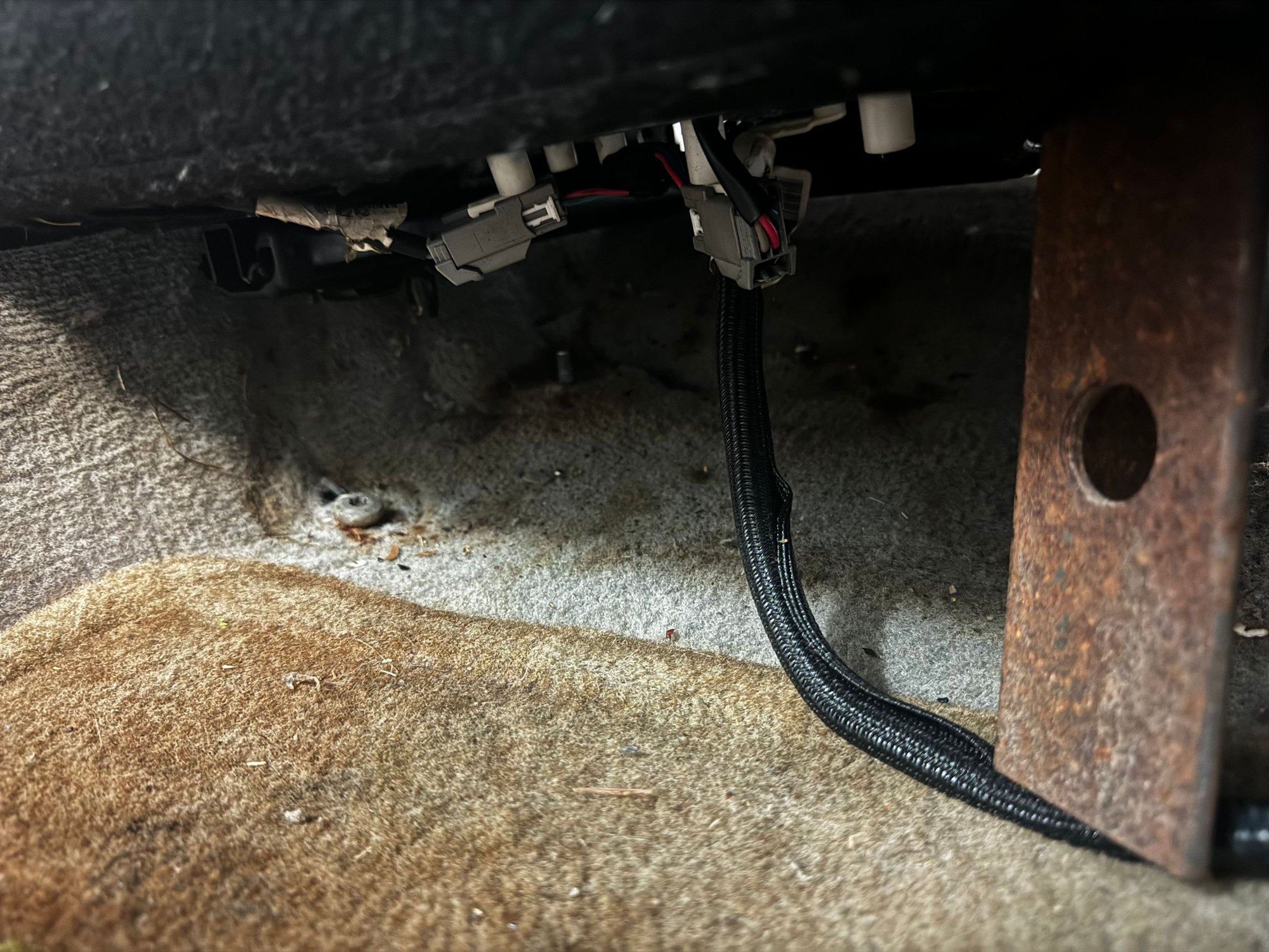 View of the left rear mounting bolt. 