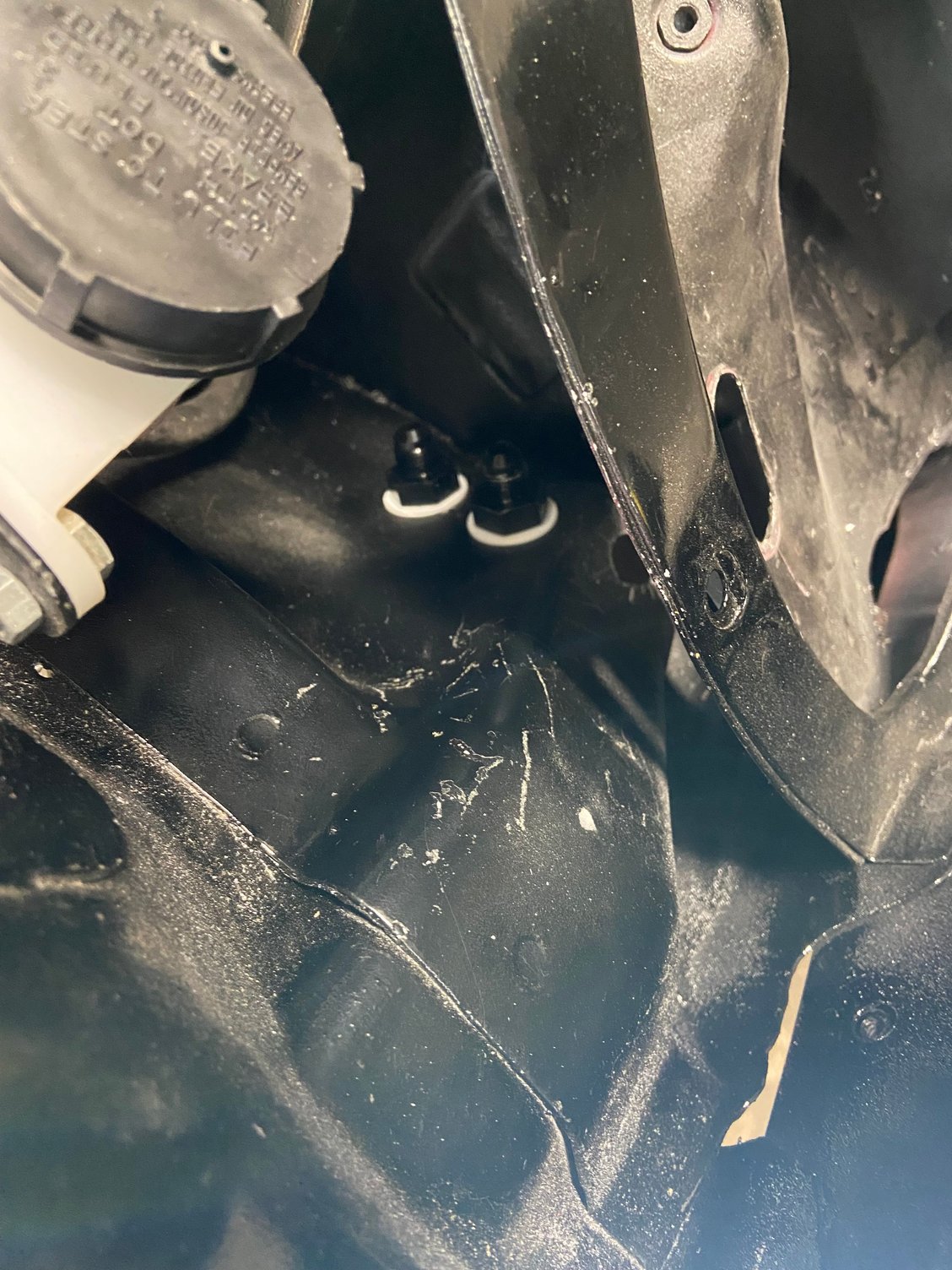 Mounted the bill head pass through fuel fitting behind the drivers shock tower.