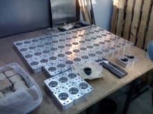 CRP's new antiroll bar bearing block getting inspected and bearings installed.