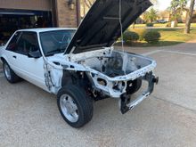 Taking the front fenders and cap off the car has made it so much easier to work on!