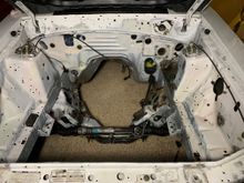 I degreased the engine compartment several times and then I used a rust colored Scotchbrite pad from the paint supply house to rough up the OEM paint 