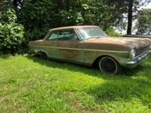 This is how we found her sitting in all her glory. 1965 Chevy Nova. Stay tuned for a complete small tire (275 60 15) drag car build