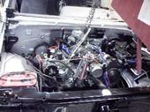 Dropping in the LS1 after painting the engine bay