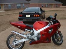 Picture of my bike and car in my driveway.