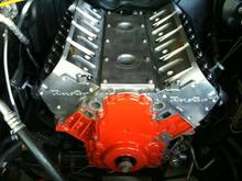 Got new trickflow 220ci heads on, and valve train in.  And yes I sure did paint the whole block orange.