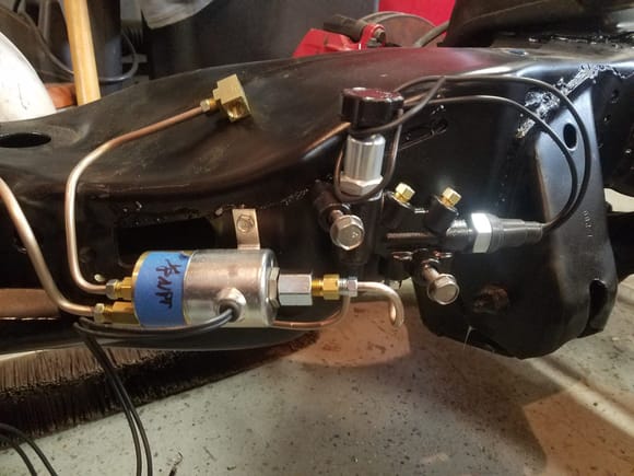 I decided to go with a Wilwood front and rear disc proportioning valve with a built in rear disc bias adjuster.  I also installed a line lock, because I've always wanted one and this really is the perfect time to plumb one in.
