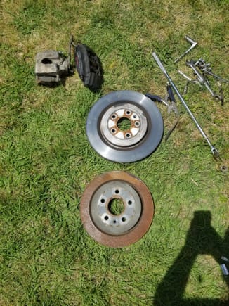 Removed giant ass rear brembos and swapped a set of stock v6 calipers and rotors just a pic to show size difference 