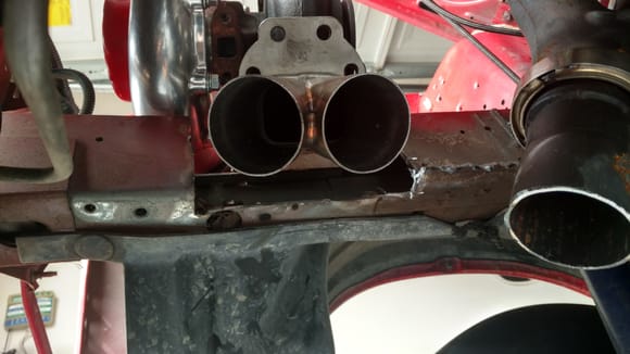 Cut into the frame so I could move the turbo out away from the water pump. Later I'll box it up.