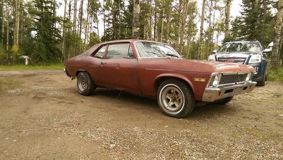 This is my 71 Acadian that I bought when I was 15. I drove it for a few years, then the timing chain went and it just got parked for ten years. It came with a horrible 307 and is incredibly rusty and not worth fixing. I love this car though and have lots of good memories in it. The interior is actually pretty sweet and black so I used it on the 73